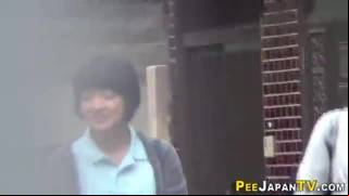 Asian teens caught peeing